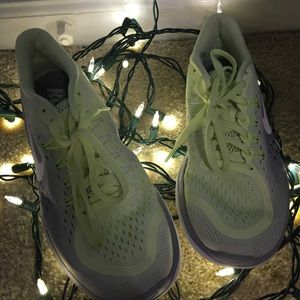 Yellow and grey tennis shoes